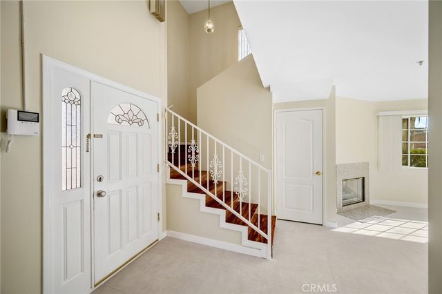 a view of a hallway with staircase