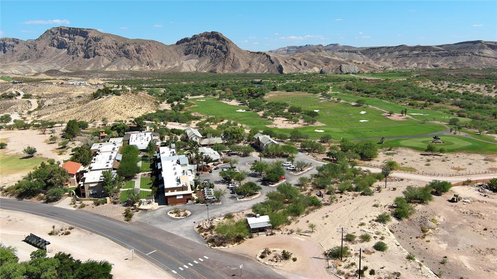 Lot 1 Riverview Terlingua, TX 79852 - Photo 2 of 7 an aerial view of residential houses with outdoor space and trees