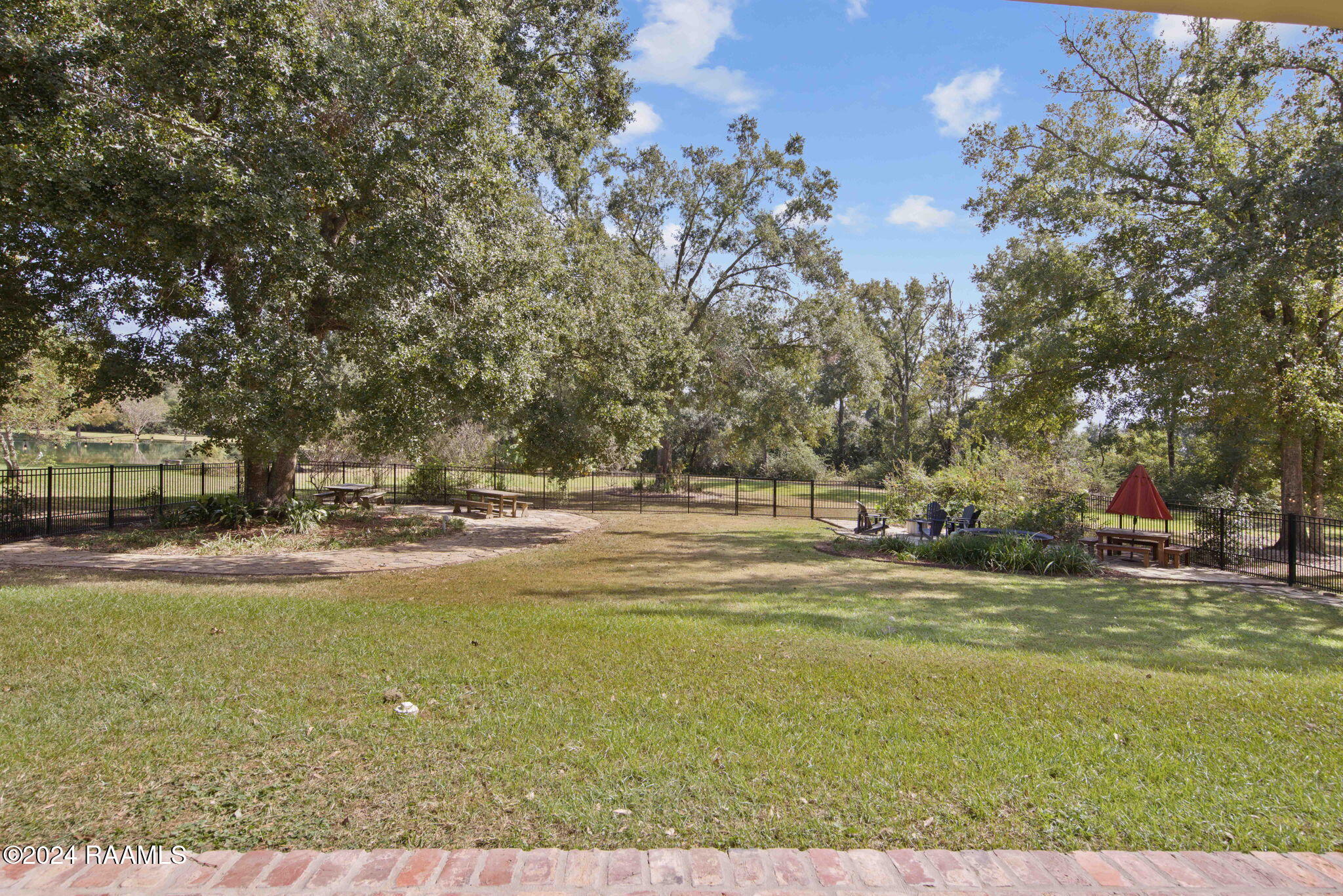 335 Travailleur Road Lafayette, LA 70506 - Photo 37 of 46 Backyard view from porch