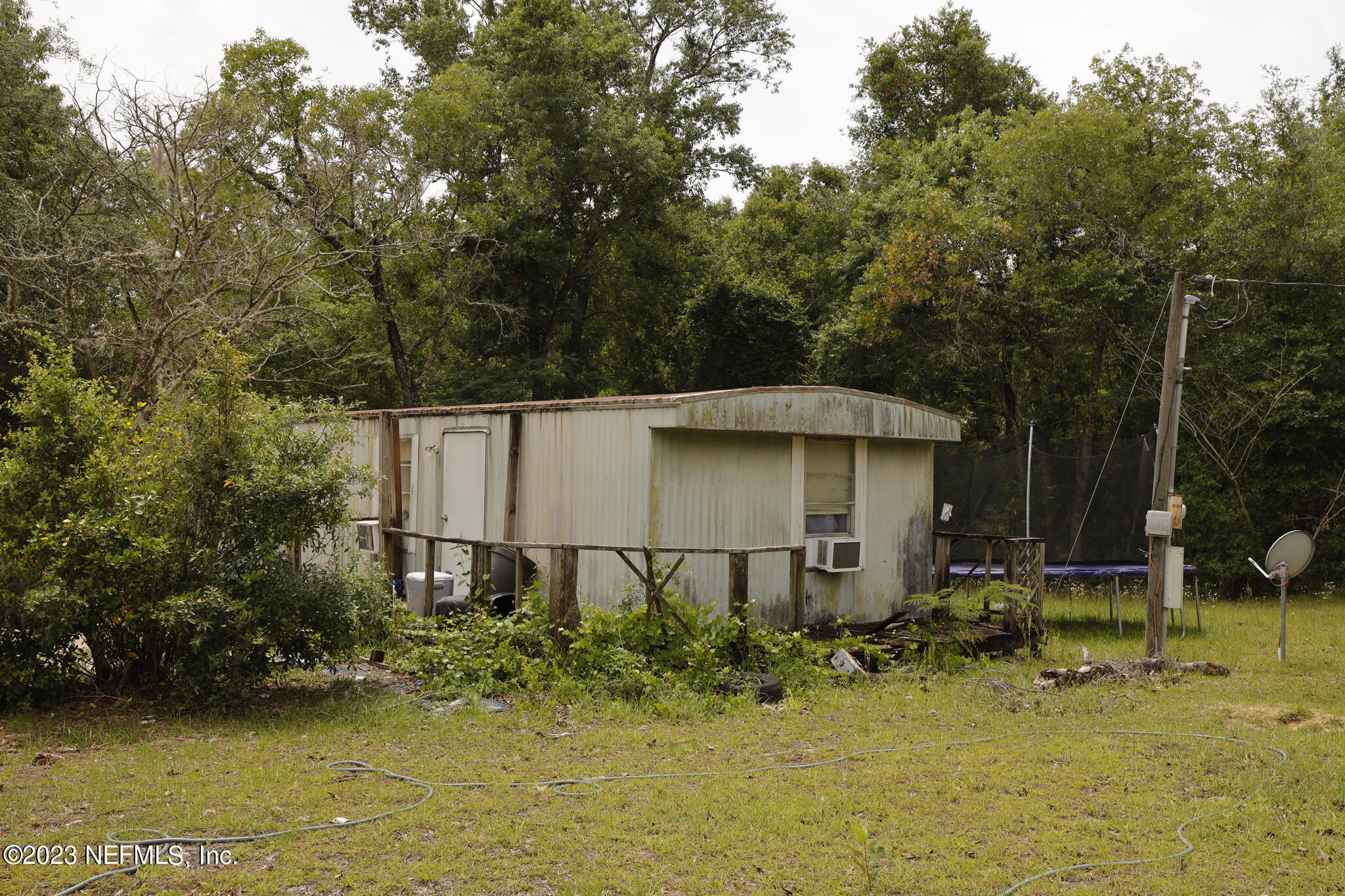 7354 Yale Street Keystone Heights, FL 32656 - Photo 13 of 13 a backyard of a house with lots of green space