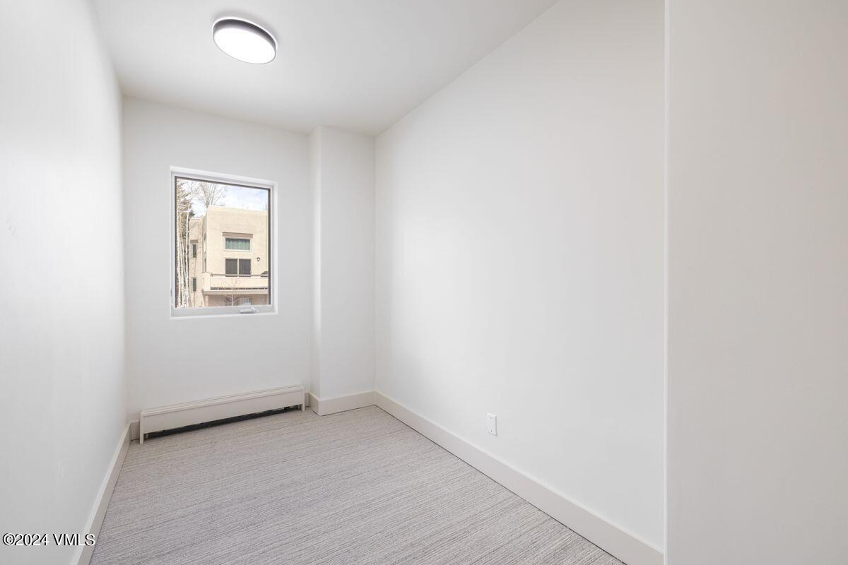 751 Singletree Road, Unit 1 Edwards, CO 81632 - Photo 18 of 33 an empty room with a window
