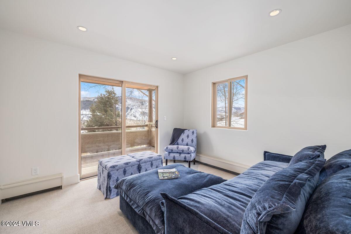 751 Singletree Road, Unit 1 Edwards, CO 81632 - Photo 25 of 33 a living room with furniture and a window