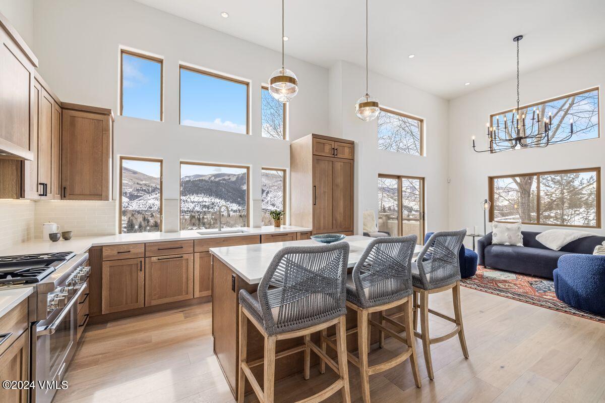 751 Singletree Road, Unit 1 Edwards, CO 81632 - Photo 10 of 33 a view of a dining room with furniture window and outside view