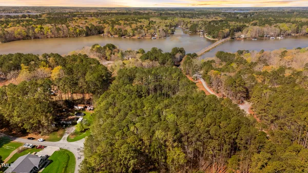 an aerial view of lake residential houses with outdoor space