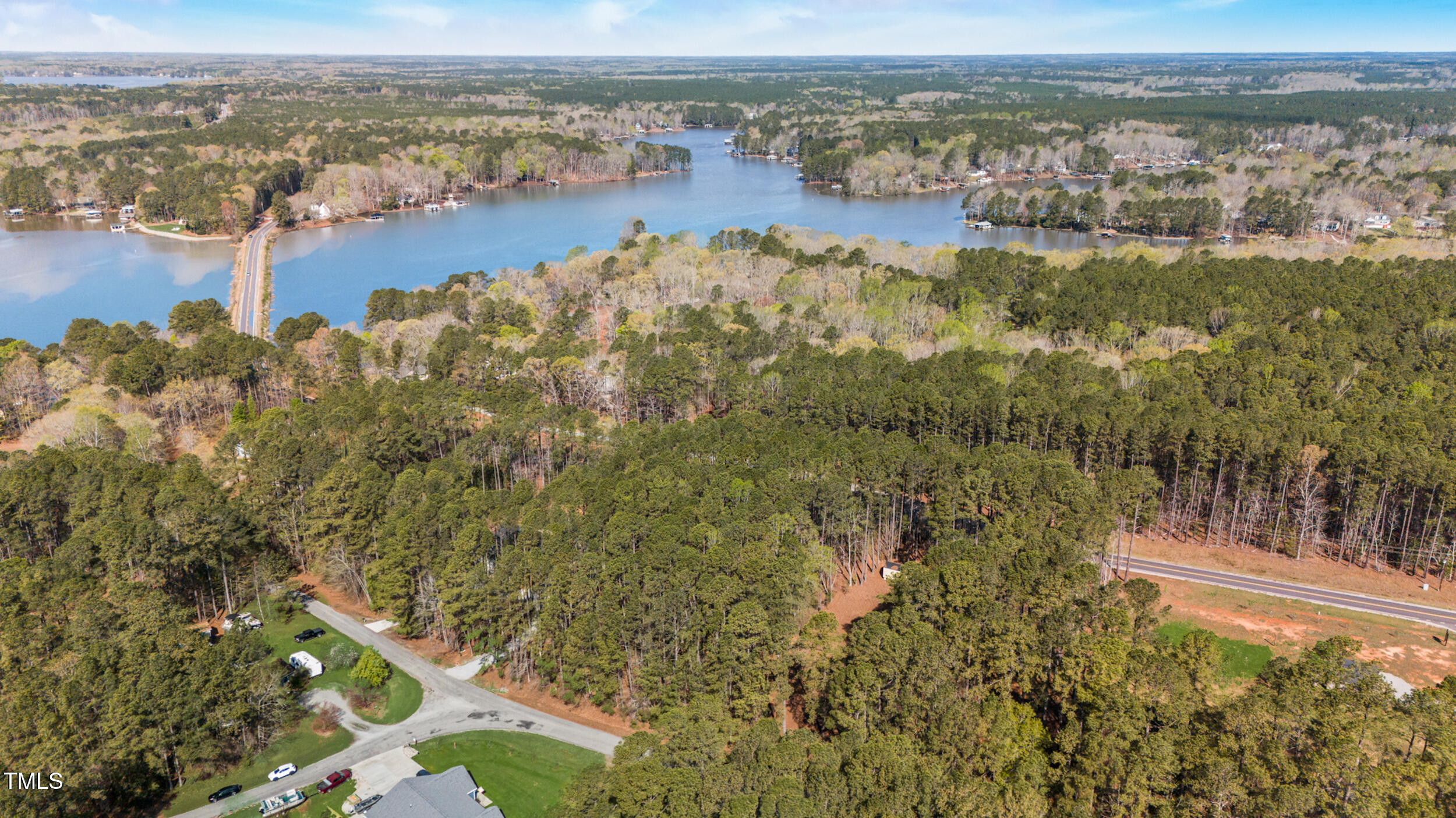 Lot 84 Twin Oaks Lane Littleton, NC 27850 - Photo 3 of 13 an aerial view of residential building with outdoor space and lake view