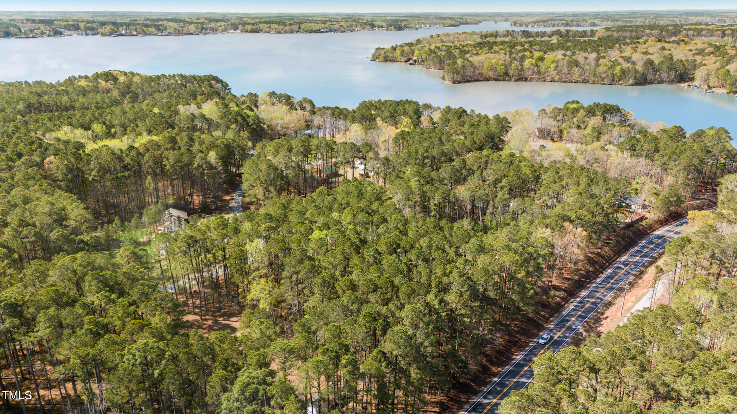 Lot 84 Twin Oaks Lane Littleton, NC 27850 - Photo 6 of 13 a view of a lake with a mountain