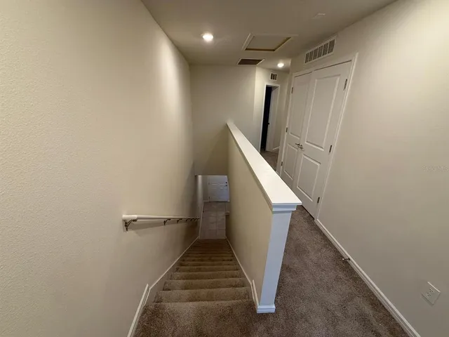 an empty room with closet area