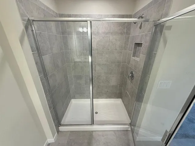 a view of a room with racks on the wall