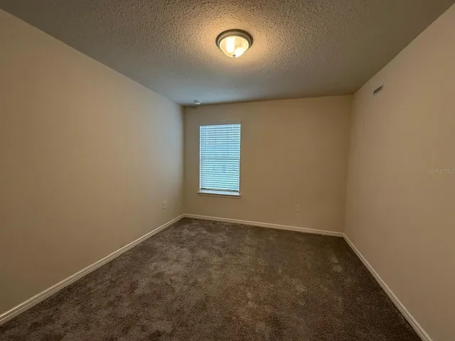a bathroom with a toilet a sink and a bathtub