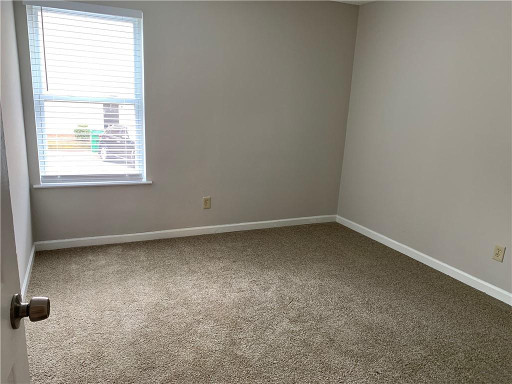 2046 Oak Park Lane Decatur, GA 30032 - Photo 12 of 14 an empty room with a window