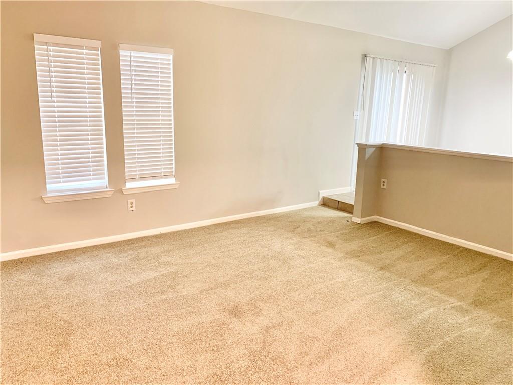2046 Oak Park Lane Decatur, GA 30032 - Photo 2 of 14 an empty room with a window