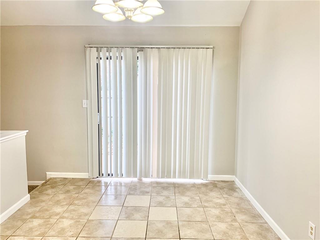 2046 Oak Park Lane Decatur, GA 30032 - Photo 4 of 14 an empty room with windows