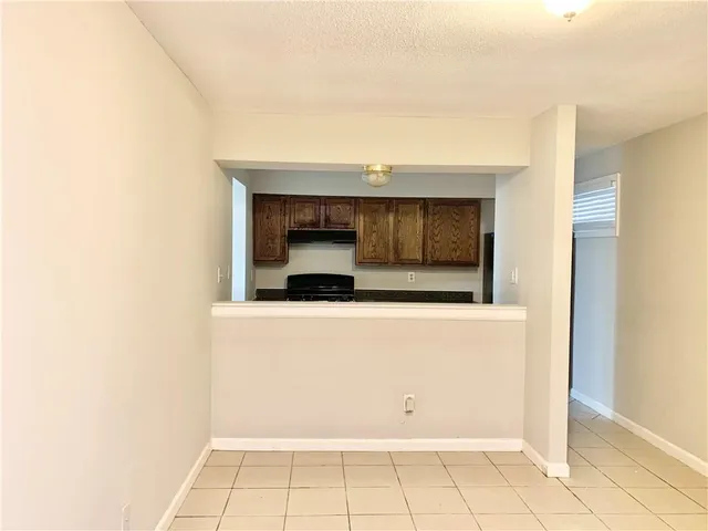 a living room with a wooden floor