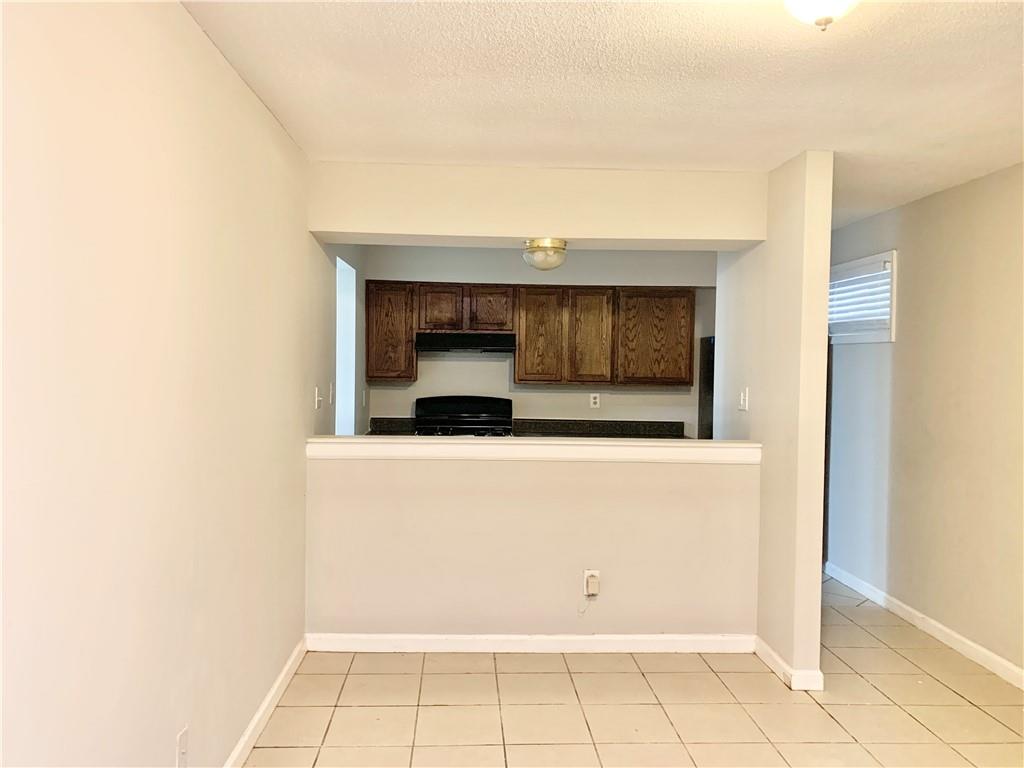 2046 Oak Park Lane Decatur, GA 30032 - Photo 7 of 14 a living room with a wooden floor