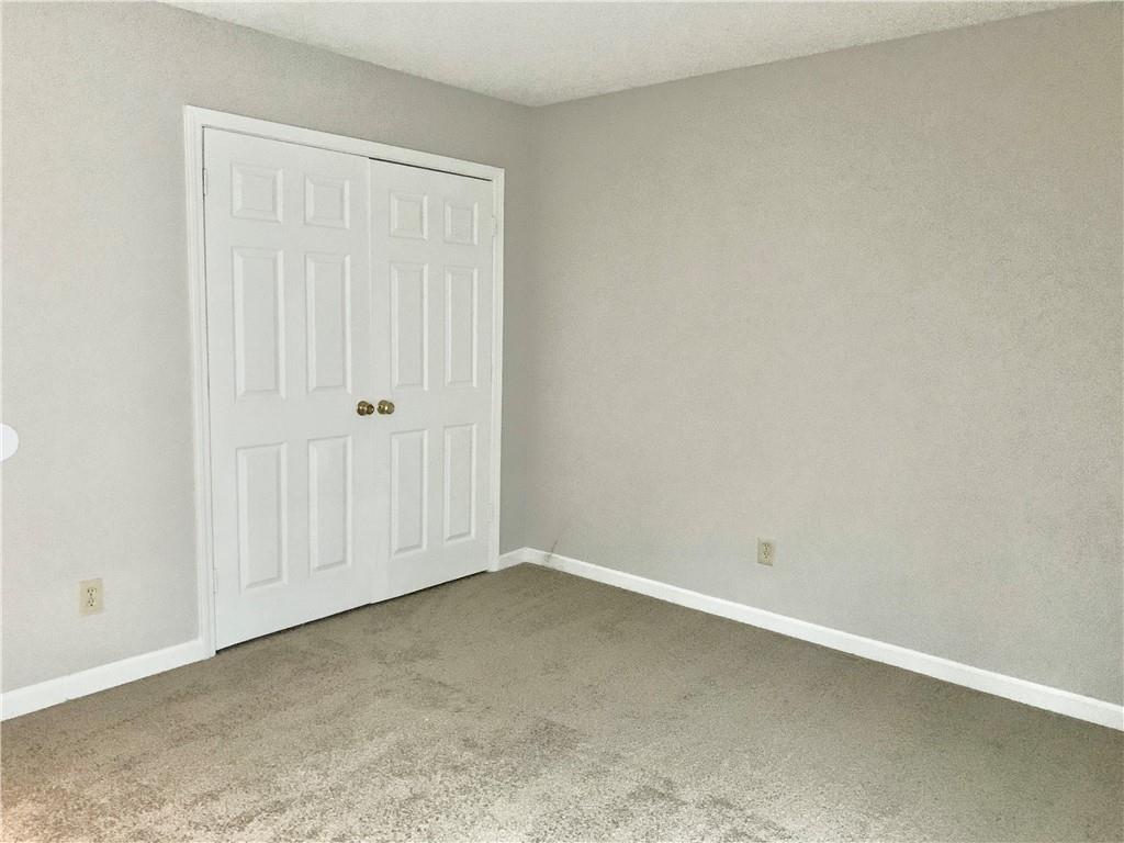 2046 Oak Park Lane Decatur, GA 30032 - Photo 8 of 14 an empty room with closet area