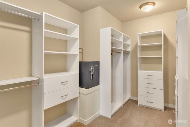 a view of an empty walk in closet