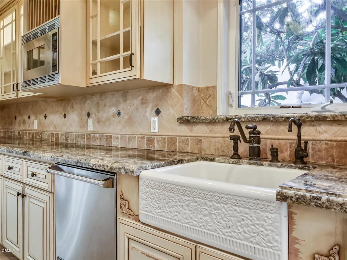 1501 Broadview Drive Glendale, CA 91208 - Photo 15 of 39 a kitchen with stainless steel appliances granite countertop a sink and a granite counter tops