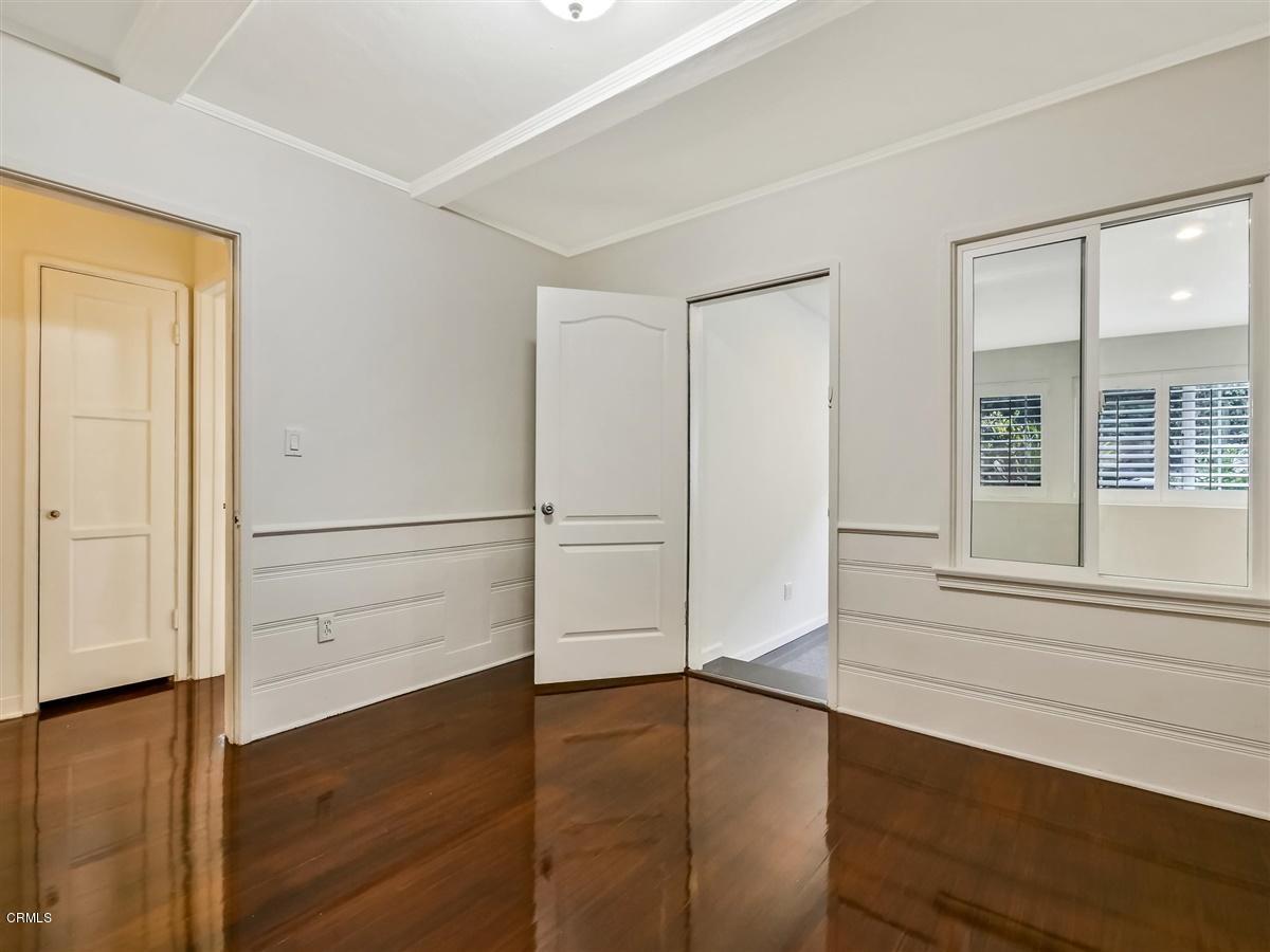 1501 Broadview Drive Glendale, CA 91208 - Photo 20 of 39 an empty room with wooden floor closet and windows