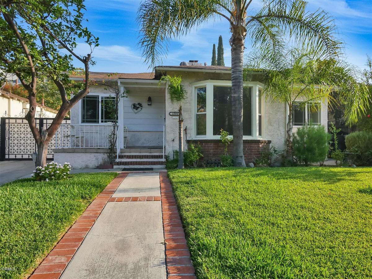 1501 Broadview Drive Glendale, CA 91208 - Photo 3 of 39 front view of a house with a yard and palm trees