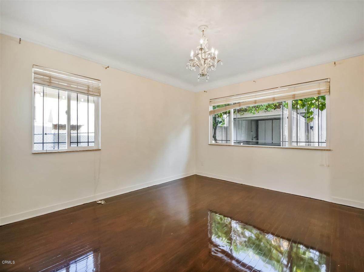 1501 Broadview Drive Glendale, CA 91208 - Photo 22 of 39 a view of an empty room with wooden floor and a window
