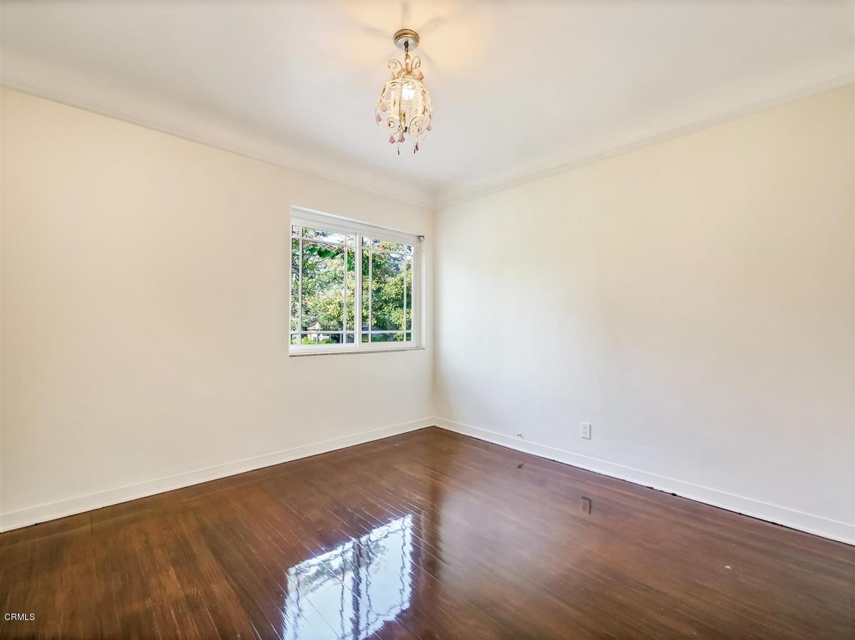 1501 Broadview Drive Glendale, CA 91208 - Photo 26 of 39 an empty room with wooden floor and windows