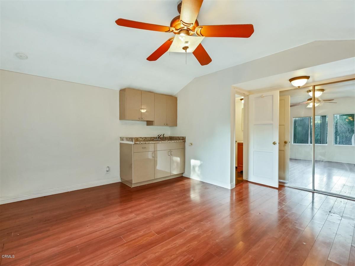 1501 Broadview Drive Glendale, CA 91208 - Photo 31 of 39 a view of empty room with wooden floor and fan
