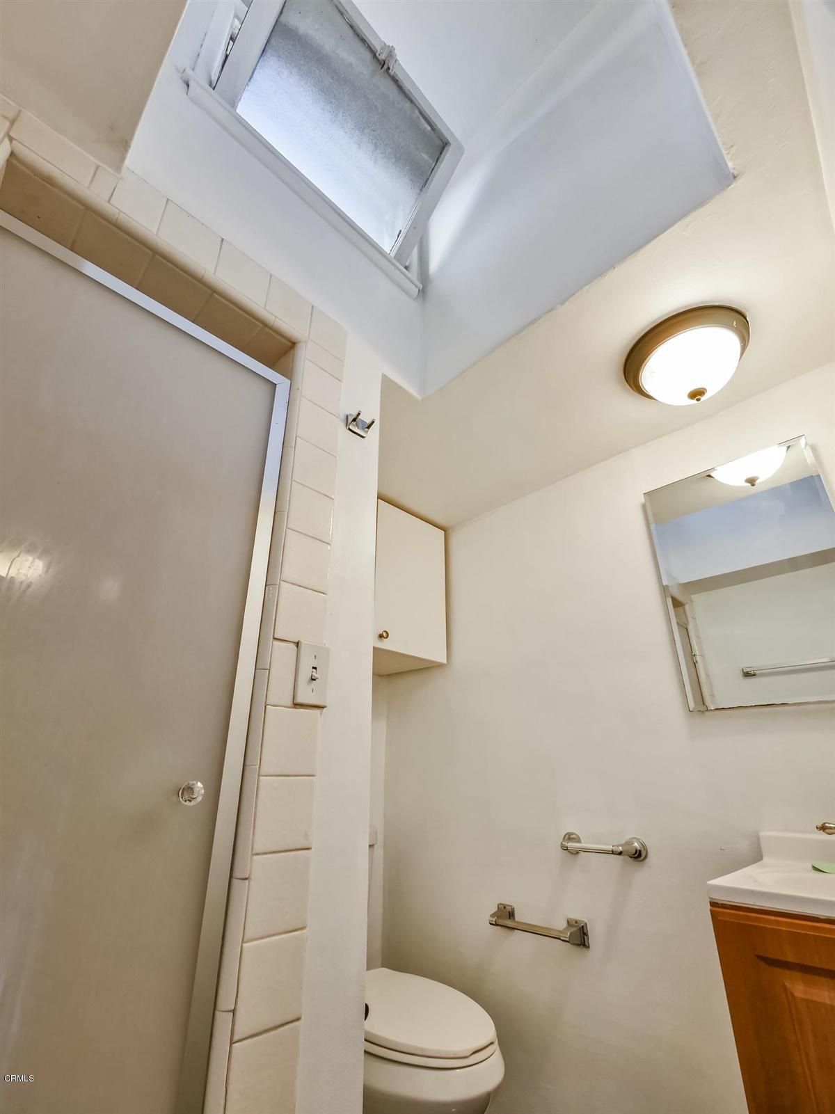 1501 Broadview Drive Glendale, CA 91208 - Photo 34 of 39 a bathroom with a sink a toilet and shower