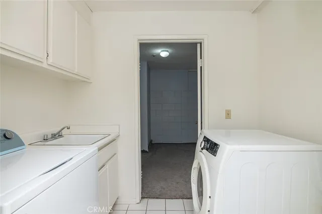 a view of balcony with a table and chairs