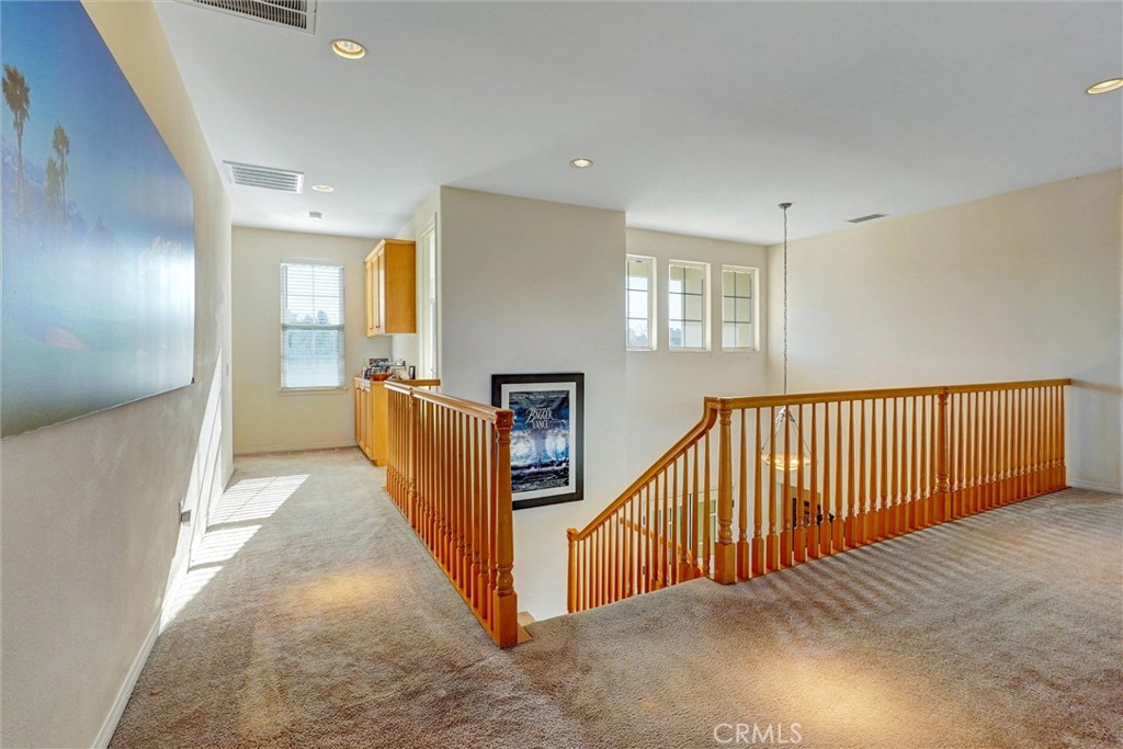 14079 Stagecoach Trail Moorpark, CA 93021 - Photo 23 of 47 a view of a hallway with windows