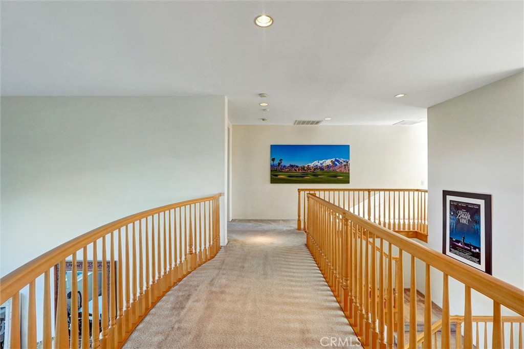 14079 Stagecoach Trail Moorpark, CA 93021 - Photo 27 of 47 a view of a hallway with wooden floor