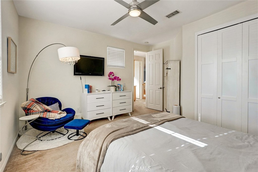 14079 Stagecoach Trail Moorpark, CA 93021 - Photo 31 of 47 a bedroom with a bed and a flat screen tv