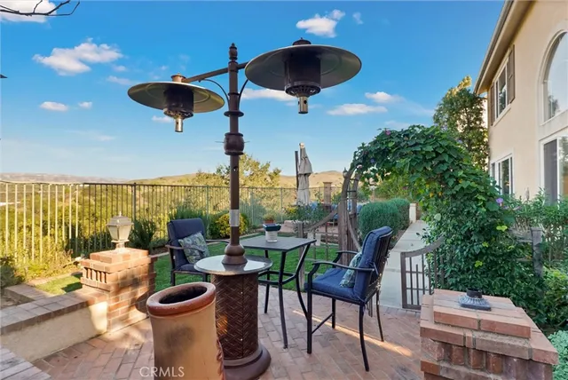 a view of a patio with swimming pool