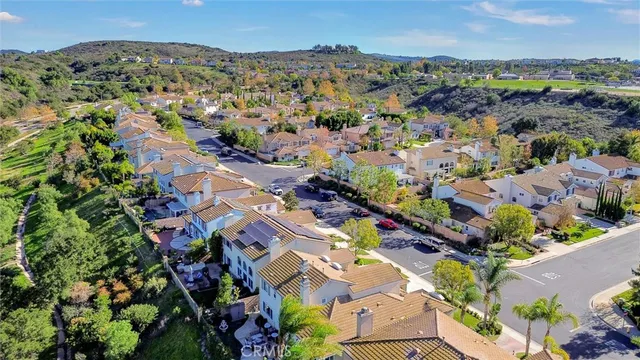 an aerial view of a city with lots of residential buildings