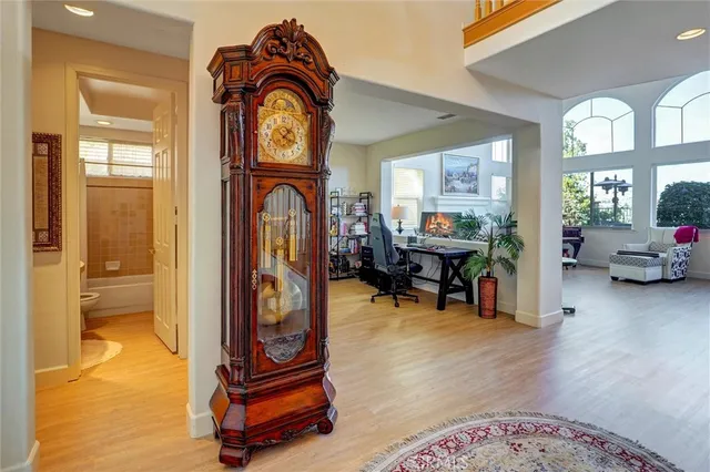 a view of living room with furniture and a large window
