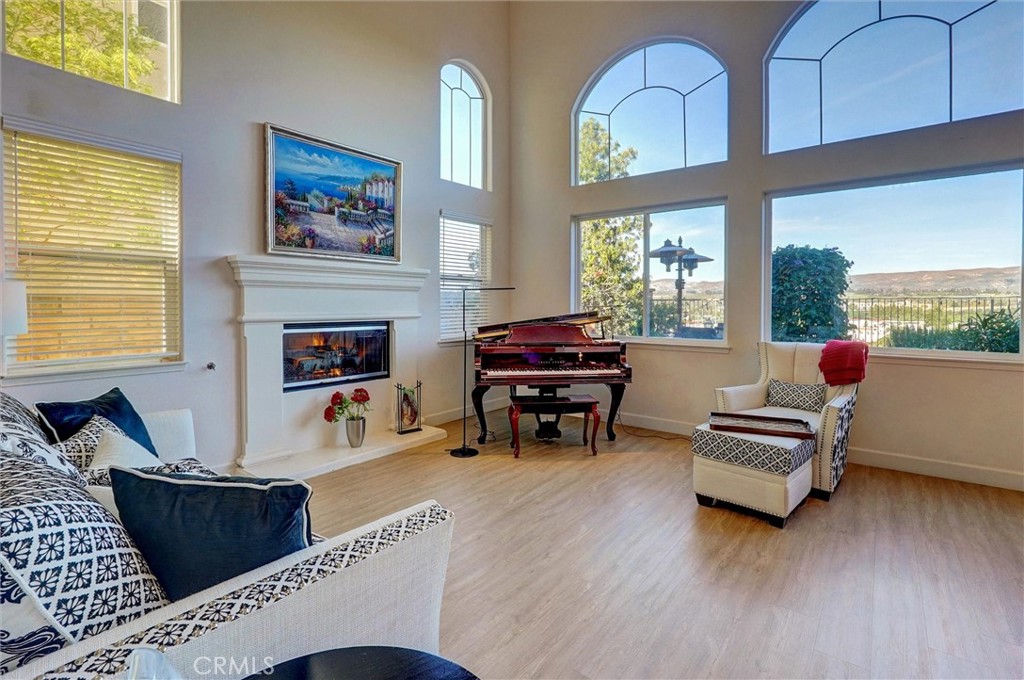 14079 Stagecoach Trail Moorpark, CA 93021 - Photo 6 of 47 a living room with furniture and a fireplace