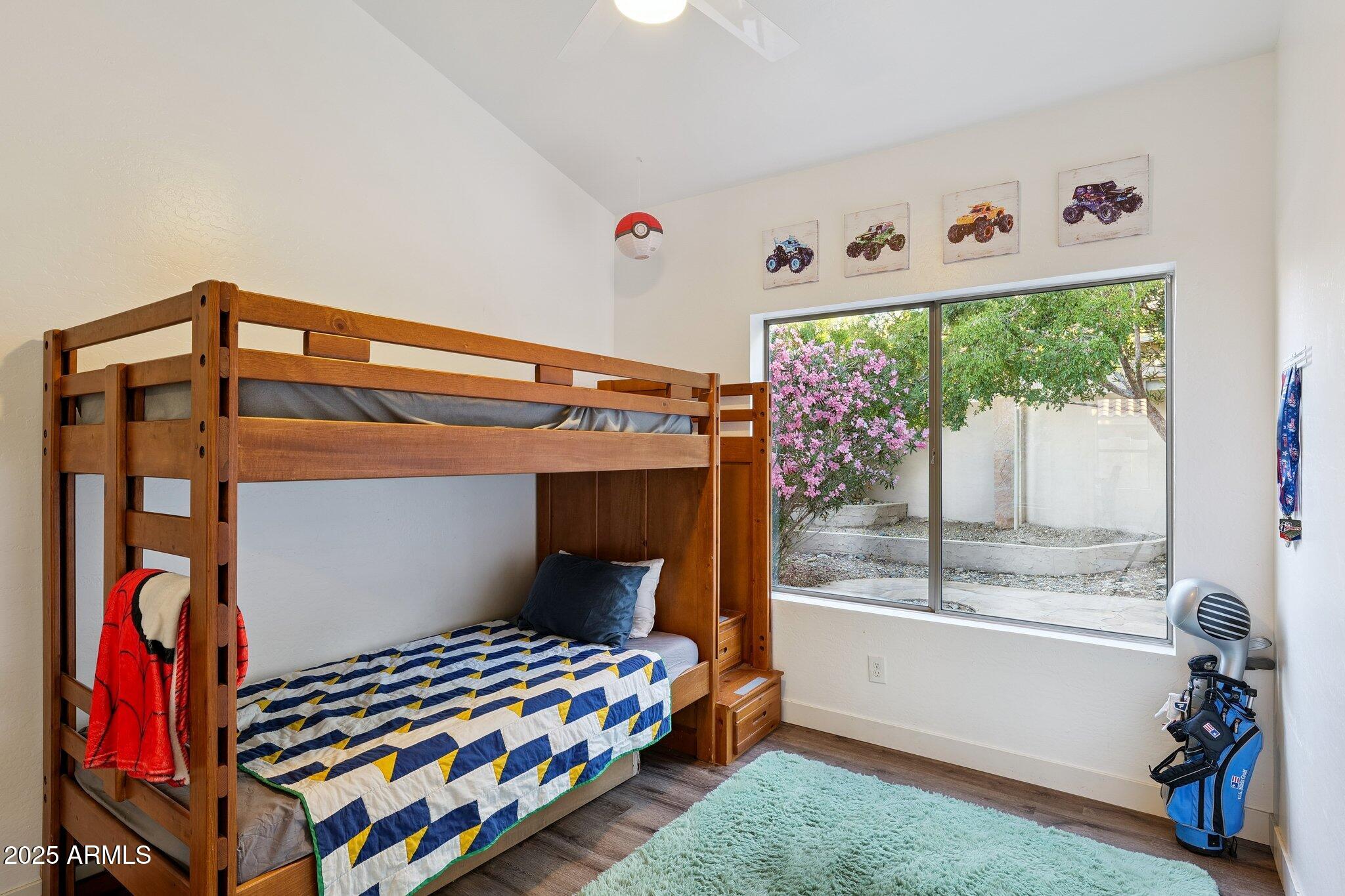 15608 South 7th Street Phoenix, AZ 85048 - Photo 16 of 30 a bedroom with a bed and a painting on the wall