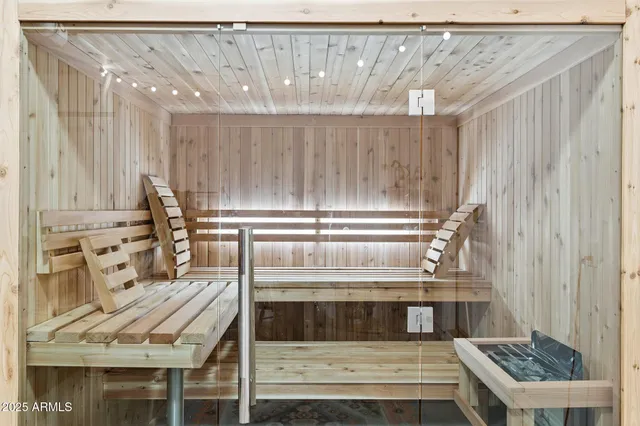 a kitchen with granite countertop a stove and a refrigerator