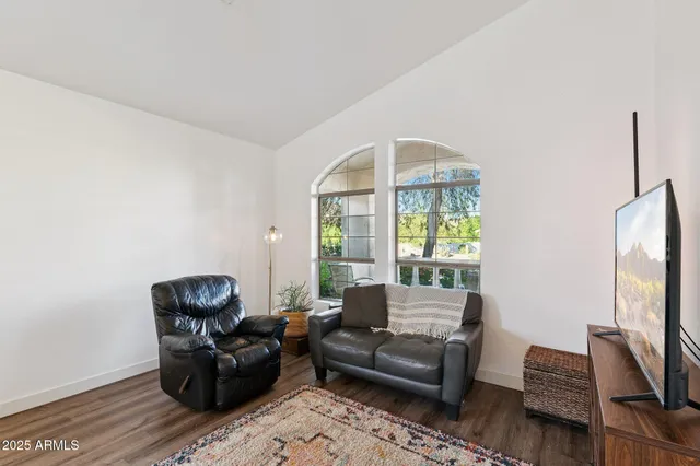 a kitchen with stainless steel appliances granite countertop a refrigerator and microwave