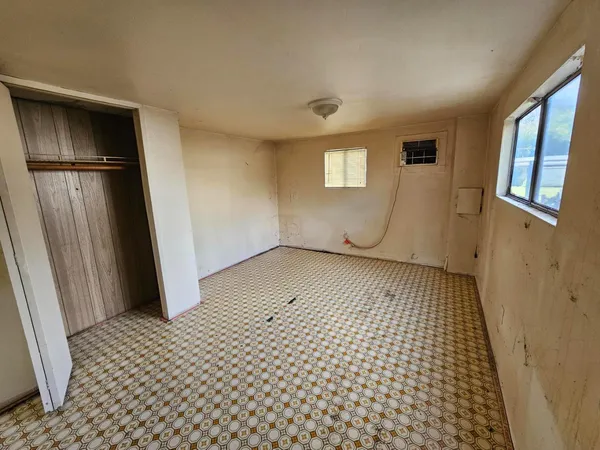 an empty room with windows