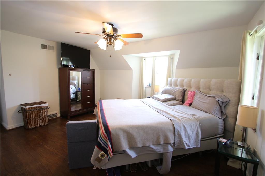 1121 Try Street Monongahela, PA 15063 - Photo 23 of 38 Spacious Main Bedroom featuring En Suite Full Bathroom, 2 Large Walk-in Closets, Hardwood Floors & Ceiling Fan Light!