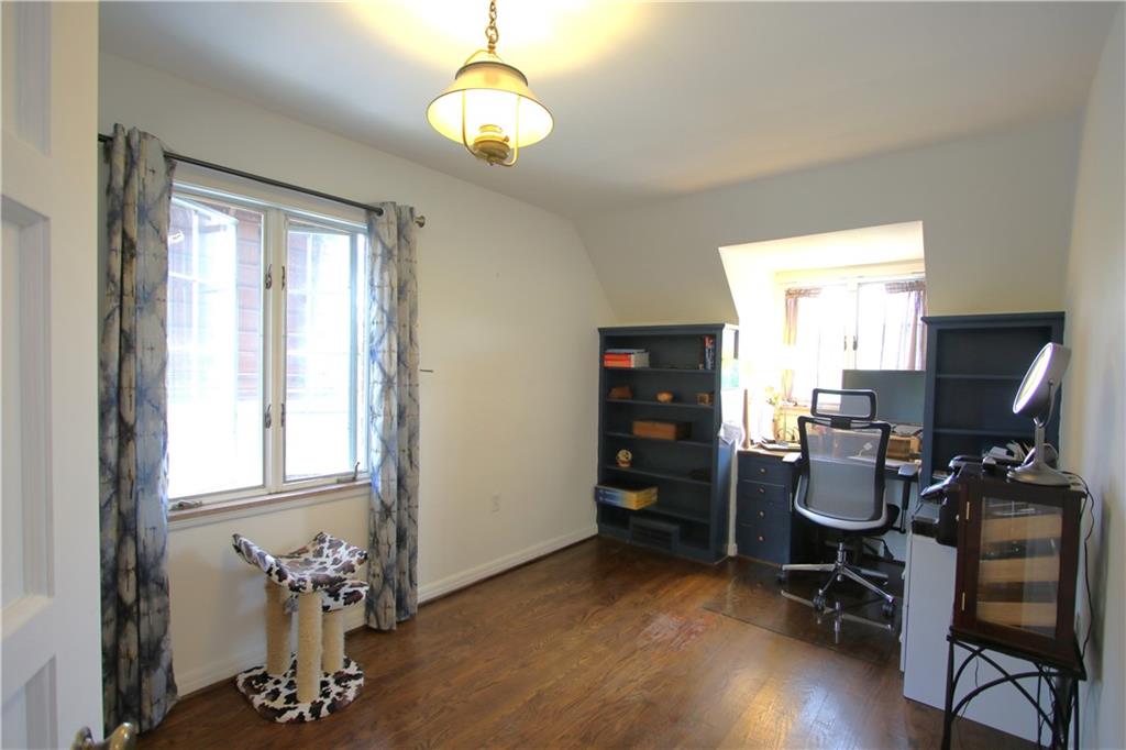 1121 Try Street Monongahela, PA 15063 - Photo 25 of 38 Beautiful Hardwood Floors and Built-in Desk area & Bookshelves in 13x12 Bedroom. Deep Walk-in Cedar Closet w/ Shelves & Original Light Fixture stays too