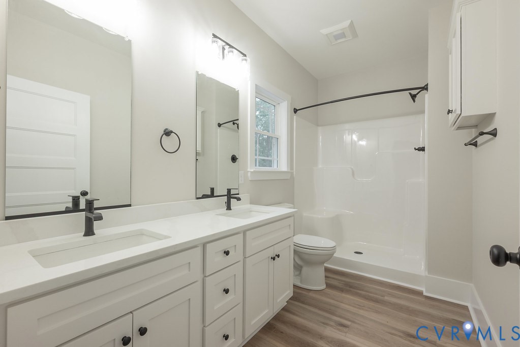 1 Tabscott Road Kents Store, VA 23084 - Photo 30 of 42 Double vanity with integrated sinks, white cabinet