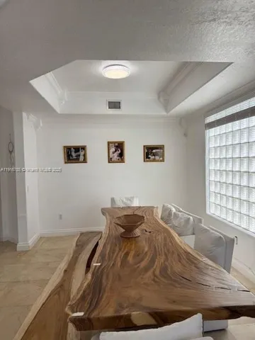 a view of a livingroom with wooden floor