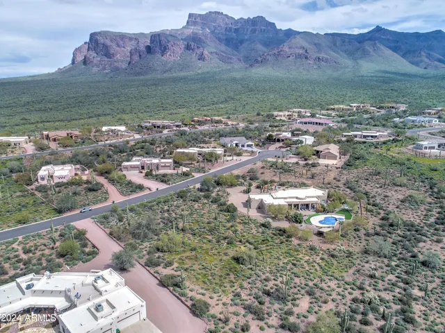 a view of a city with mountains in the background