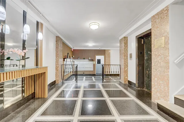 a view of en suite bathroom with a tub and a large window