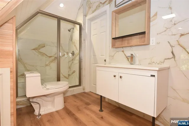 a view of an empty room and a window