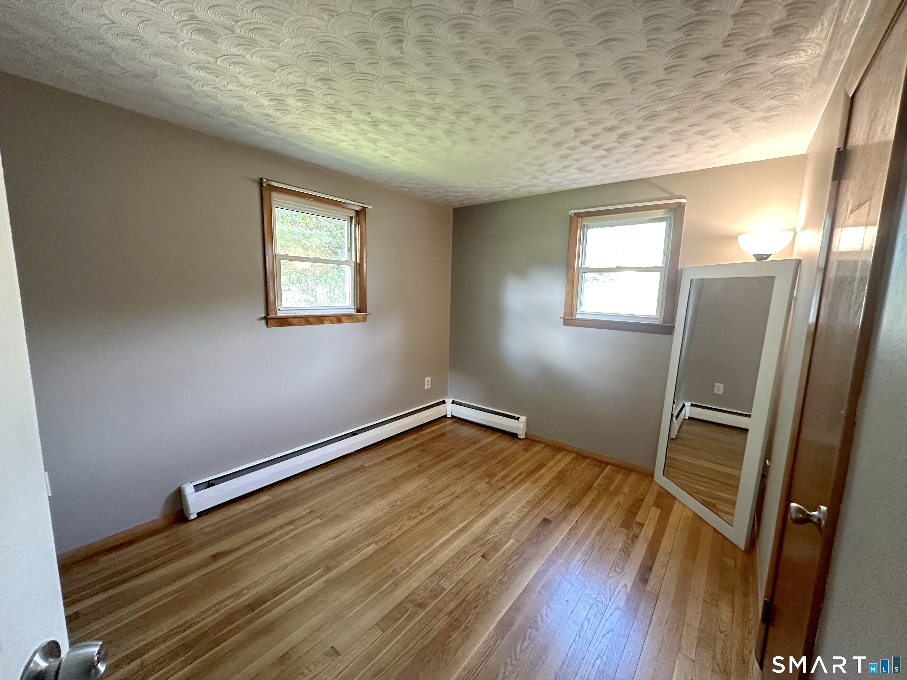 35 Brook Road Enfield, CT 06082 - Photo 11 of 25 a view of empty room with wooden floor