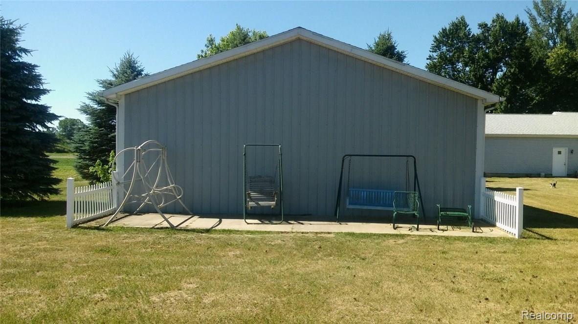19028 Williamsville Road Gregory, MI 48137 - Photo 33 of 37 pole barn back.jpg