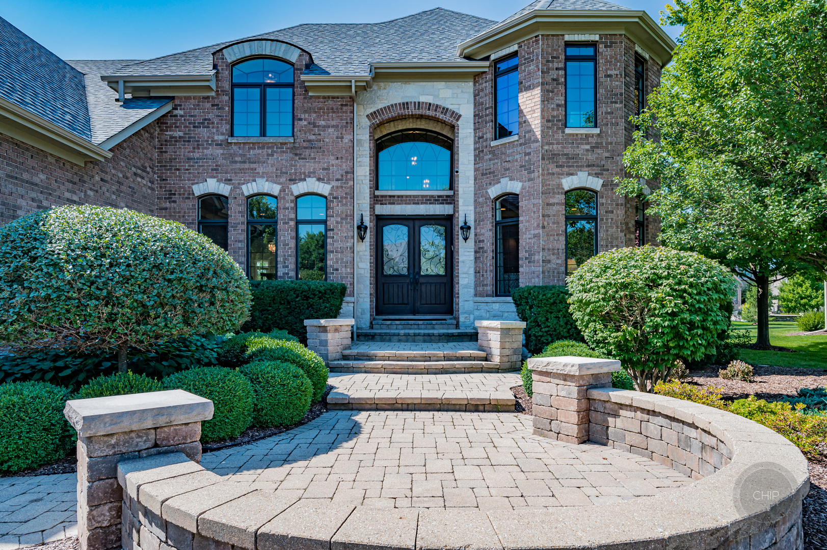 4603 Corktree Road Naperville, IL 60564 - Photo 2 of 61 a front view of a house with garden