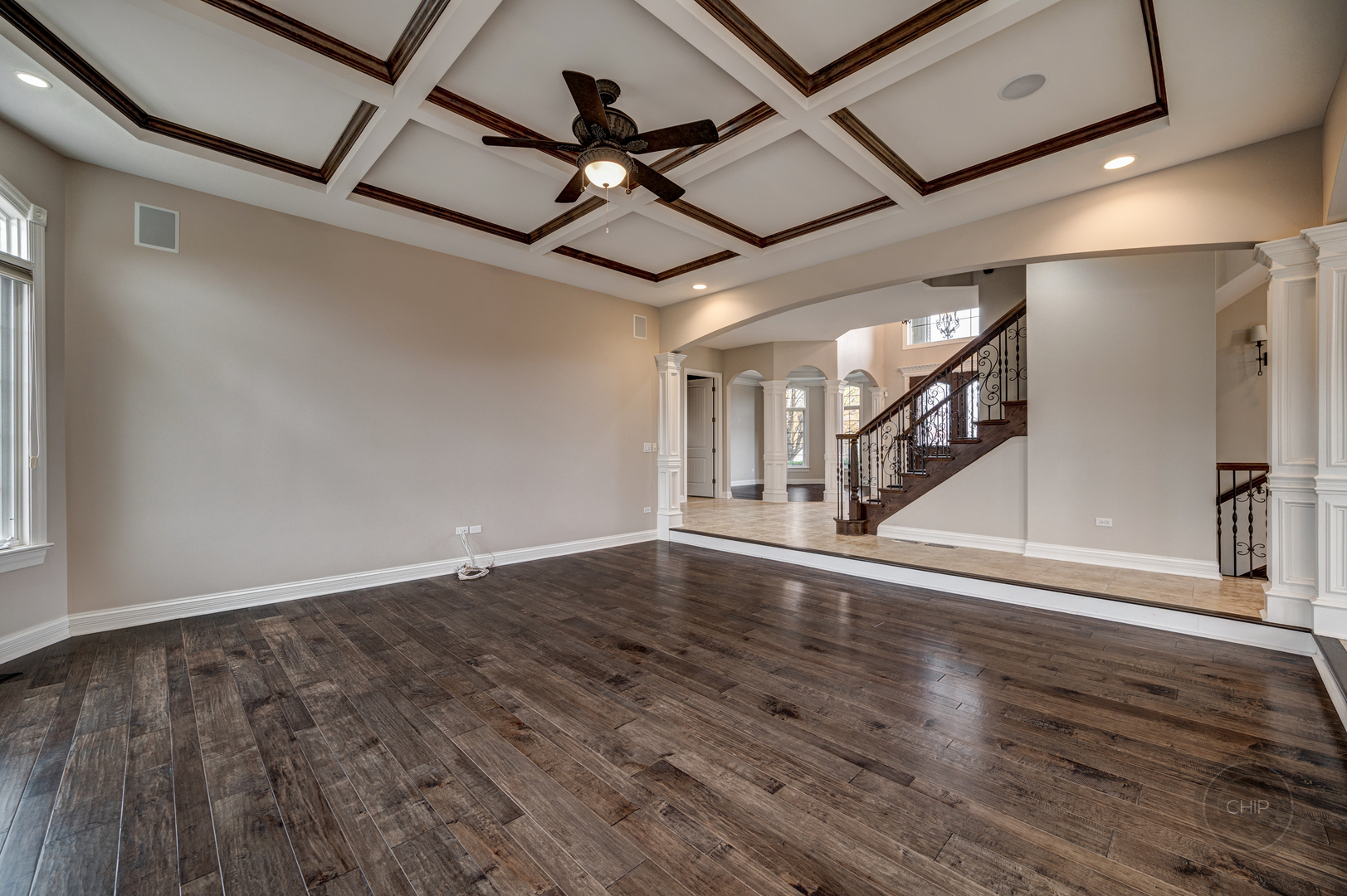 4603 Corktree Road Naperville, IL 60564 - Photo 13 of 61 a view of an empty room with wooden floor
